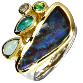 Außergewöhnlicher Ring mit spektakulären Opalen, Tsavorit und Diamant, 925er Silber, teilvergoldet, Ringgröße 54